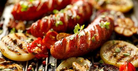 Grilled sausage and vegetables with fresh herbs