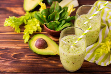 Green smoothie with avocado, spinach and celery. Healthy food
