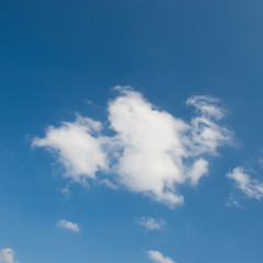 Fototapeta premium White clouds against the blue sky..