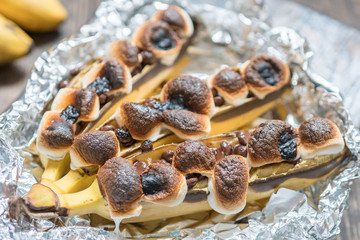 Campfire banana with marshmallow and chocolate chips