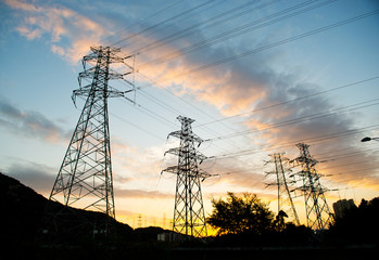 high voltage post at sunset.