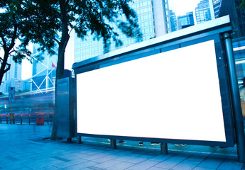 Blank billboard at a bus stop.