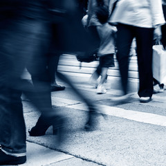 Busy city people on zebra crossing street in Hong Kong, China.