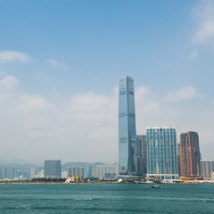Fototapeta na wymiar Beautiful scene of Hong Kong skyline, view along Victoria Harbor.