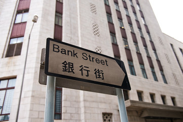 Obraz premium bank street sign in hong kong, china.