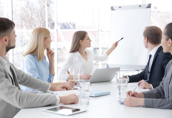 Business trainer giving presentation to group of people © Africa Studio