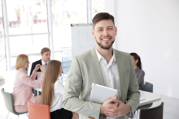Young man at business presentation © Africa Studio