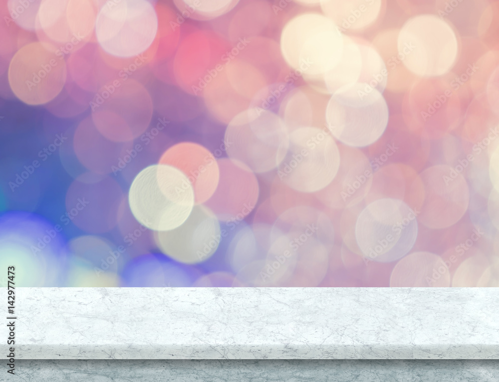 Poster white marble table top with pink and blue pastel bokeh light background,mock up template for display