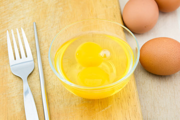 eggs yolk on the bowl  ready to cook.