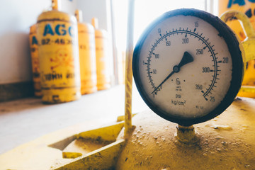 pressure gauges and valves of chlorine gas cylinders