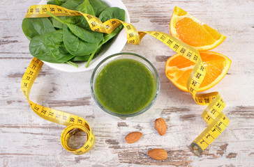 Ingredients, fresh cocktail from spinach and centimeter on wooden background, healthy nutrition and slimming