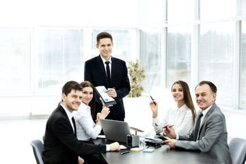 successful businessman and his business team meeting in modern office