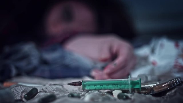 4k Homeless Drugged Woman Laying and Showing Middle Finger