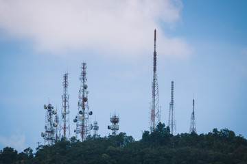 Big television and radio tower with several parabolic antenna on high  mountain
