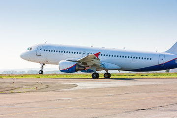 The plane lands. Heading on the runway