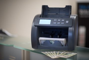Banknote counter with 50 USD banknotes