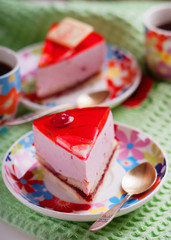 Pieces of cake and cups of coffee 
