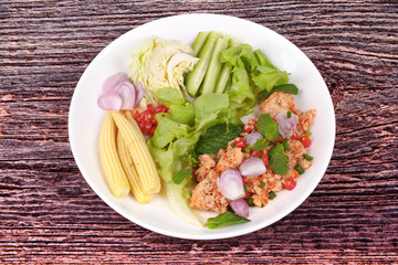 Spicy sour carp eggs of silver barb fish salad