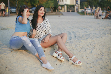 two girls in the sand