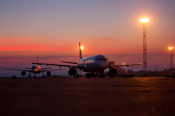 Aircrafts on the airport apron early morning