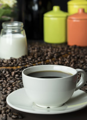 Coffee cup with coffee beans