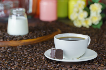 Coffee cup with coffee beans