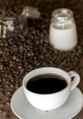 Coffee cup with coffee beans