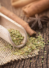 Dried marjoram spice on wood background,Origanum majorana