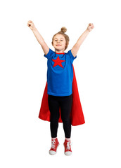 Six year blonde girl dressed like superhero having fun at home. White wall on background