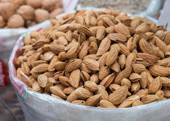 Unpeeled new harvest  almonds for sale on local Jerusalem market. Israel