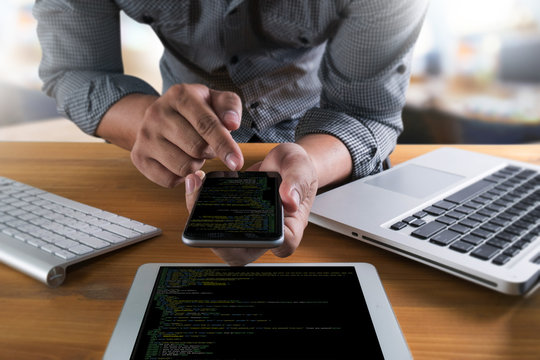 "Developer Team Working Laptop Computer Mobile Application Softwareand Web Design Online Technology Content , Web script , laptop display."