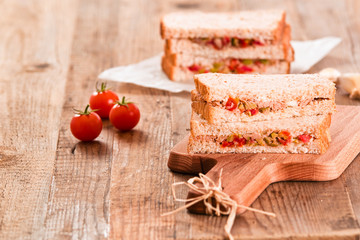 Tuna, olives and tomato sandwiches. 