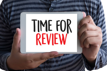 review time Business Concept , time for review , Business team hands at work with financial reports and a laptop