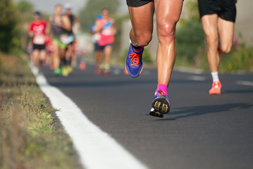 Marathon running in the light of evening