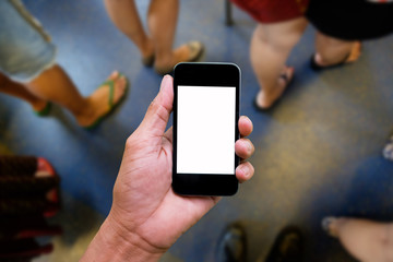 People's feet on the floor of the metro. warm tone. copy space.
