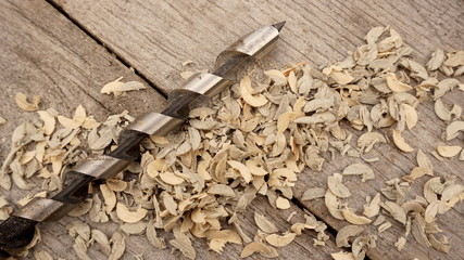 Wood Drill On Wooden Surface With Chips