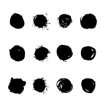 Set of brush hand drawn vector black ink circle stains isolated on the white.