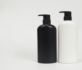 Black and white plastic bottle White background. Flask. Isolated.
