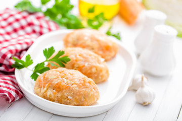 Raw, uncooked meat cutlets with vegetables, baby food