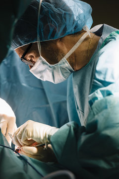 Surgeons doing surgery in the operating room