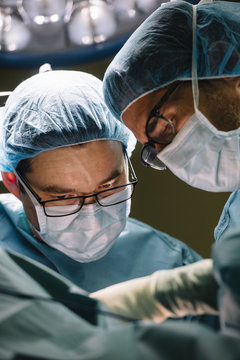 Surgeons doing surgery in the operating room