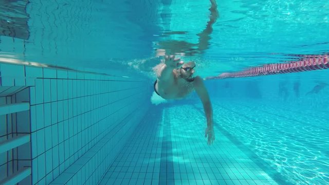 Swimmer flip turn slow motion frontal