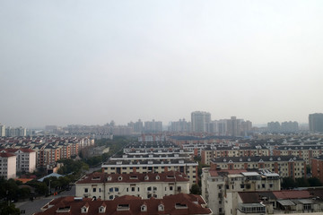 Fototapeta premium Shanghai city at morning in foggy day in Shanghai, China 
