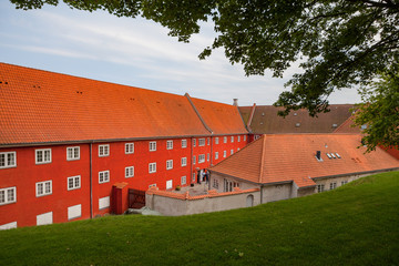 Fototapeta na wymiar Red Storehouses at Kastellet in Copenhagen, Denmark