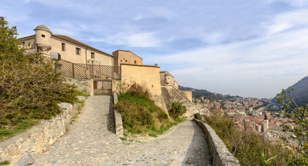 Fototapeta na wymiar San Giovanni castle and village roofs, Finalborgo, Italy