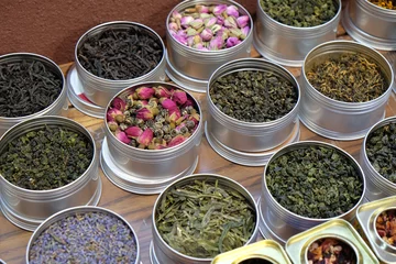  Various types of tea in metal pots exposed for sale in a Chinese tea shop in Shanghai © zatletic