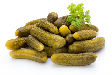 Marinated pickled cucumbers isolated on the white.