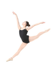 Young beautiful ballerina dancing on white background