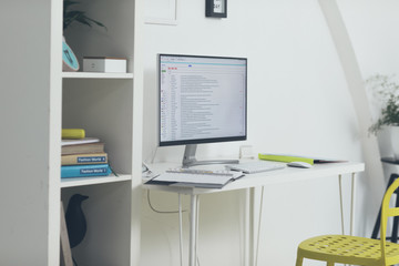 Computer and Desk in Empty Office