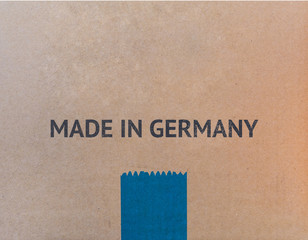 MADE IN GERMANY written on brown cardboard box with copy-space for your text.
